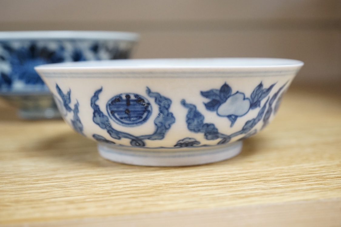 Two Chinese blue and white bowls and a lotus shaped tea pot stand, largest 15cm in diameter
